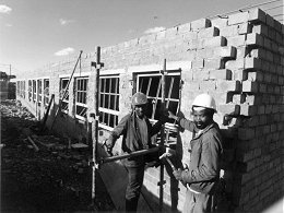 Small contractors at work during the construction of the Chesterville Extension Primary School.