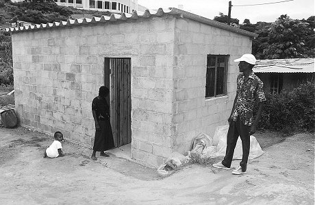 Milton Phewa views the show unit in Jamaica with interest.