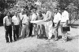 Stakeholders in the construction of a primary school along Molver Road in Cato Crest gather to inspect the plans during a site hand over meeting held in the area recently.